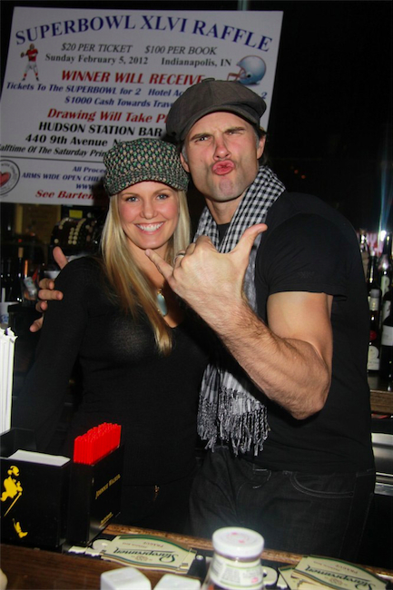 austin0278.jpg - Terri with Austin at the Stockings with Care 2011 Holiday Drive - Celebrity Bartending Event on November 16, 2011 at the Hudson Station Bar & Grill in New York City