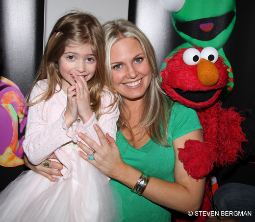 children0023.jpg - Terri and daughter Julia with Elmo at the opening night of ImaginOcean on March 31, 2010 at New World Stages, New York City, New York (Photo by Steven Bergman)